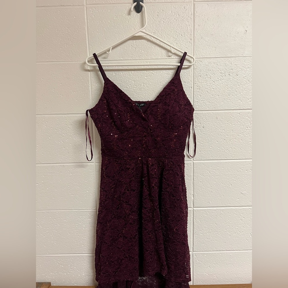 New homecoming dress, high in back to lower in front.